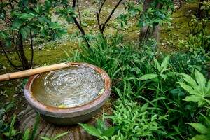 Stone wash basin found in Japanese gardens. Annex landscape thing of a Japanese garden. Washbowl for a tea-ceremony room